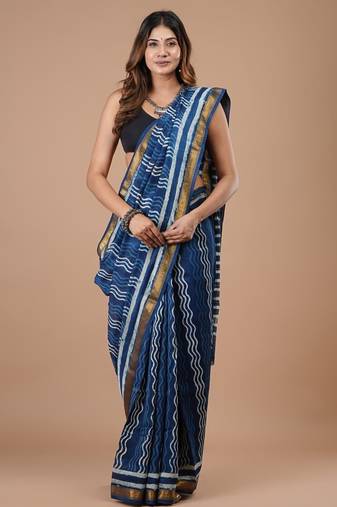 Blue maheshwari silk saree with woven borders and beautiful hand block print