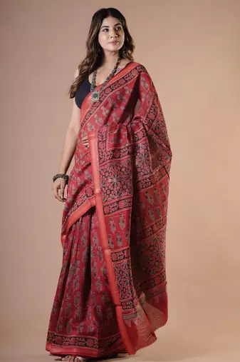 Red maheshwari silk saree with woven borders and beautiful hand block print