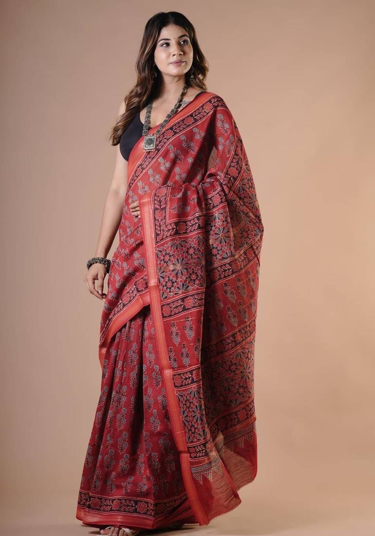Red maheshwari silk saree with woven borders and beautiful hand block print