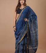 Blue maheshwari silk saree with woven borders and beautiful hand block print