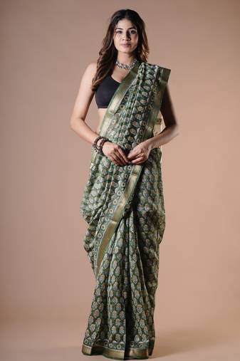 Green maheshwari silk saree with woven borders and beautiful hand block print