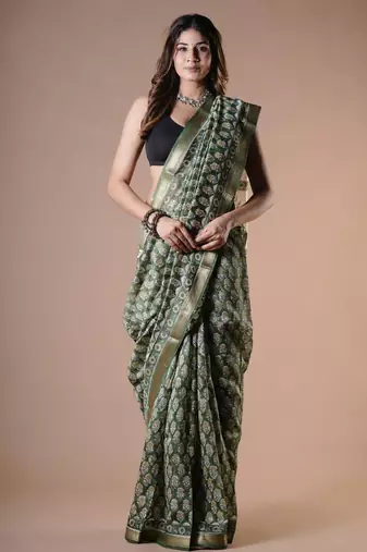 Green maheshwari silk saree with woven borders and beautiful hand block print