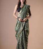 Green maheshwari silk saree with woven borders and beautiful hand block print