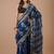 Blue maheshwari silk saree with woven borders and beautiful hand block print