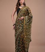 Green maheshwari silk saree with woven borders and beautiful hand block print