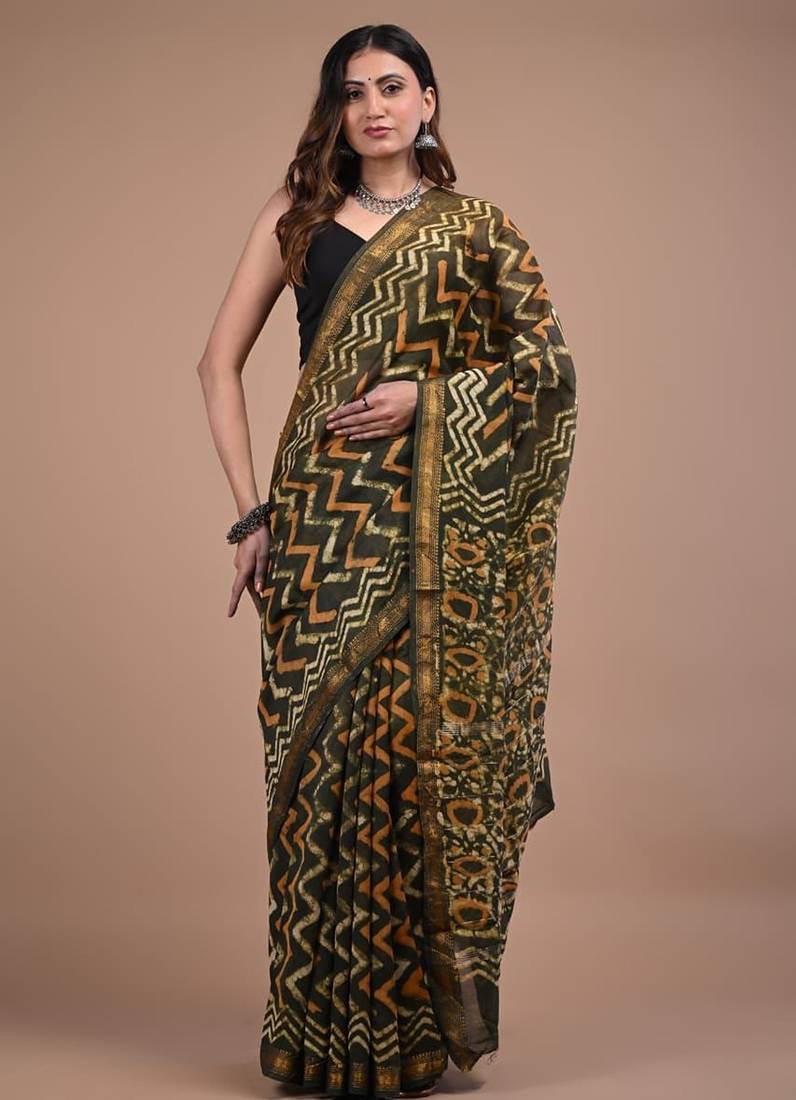 Green maheshwari silk saree with woven borders and beautiful hand block print