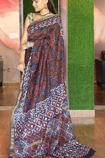 Brown maheshwari silk saree with woven borders and beautiful hand block print