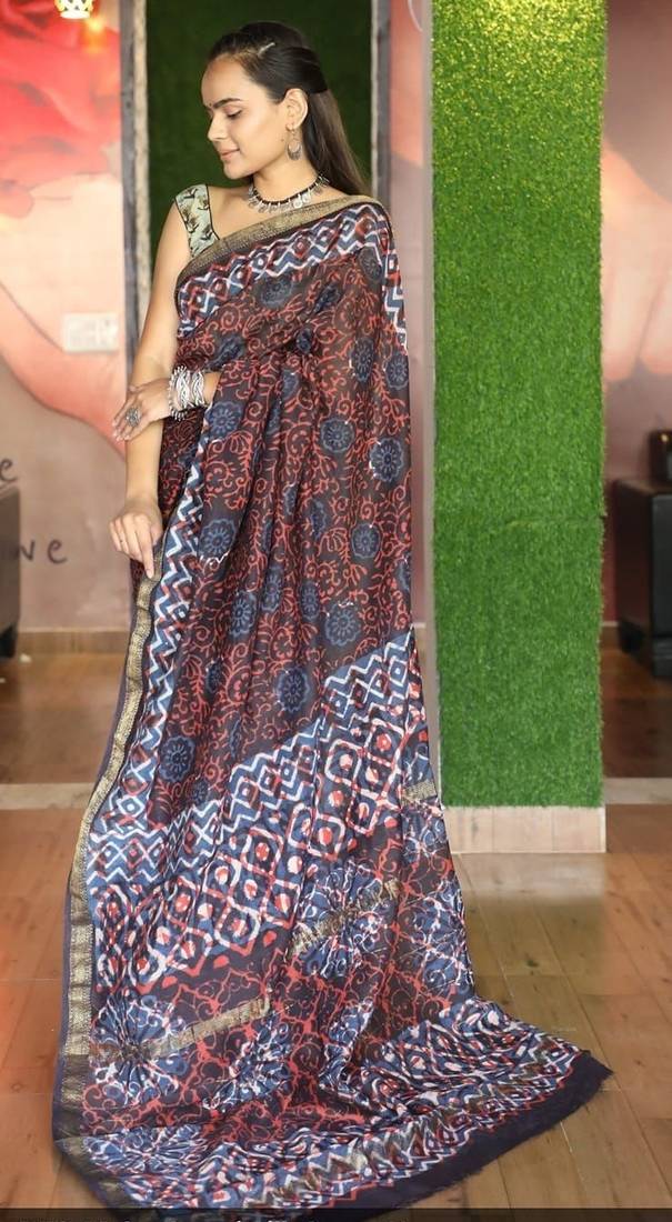 Brown maheshwari silk saree with woven borders and beautiful hand block print