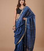 Blue maheshwari silk saree with woven borders and beautiful hand block print
