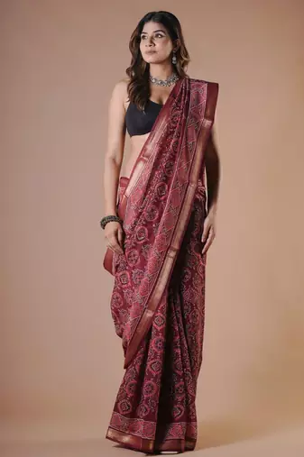 Maroon maheshwari silk saree with woven borders and beautiful hand block print