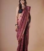 Maroon maheshwari silk saree with woven borders and beautiful hand block print