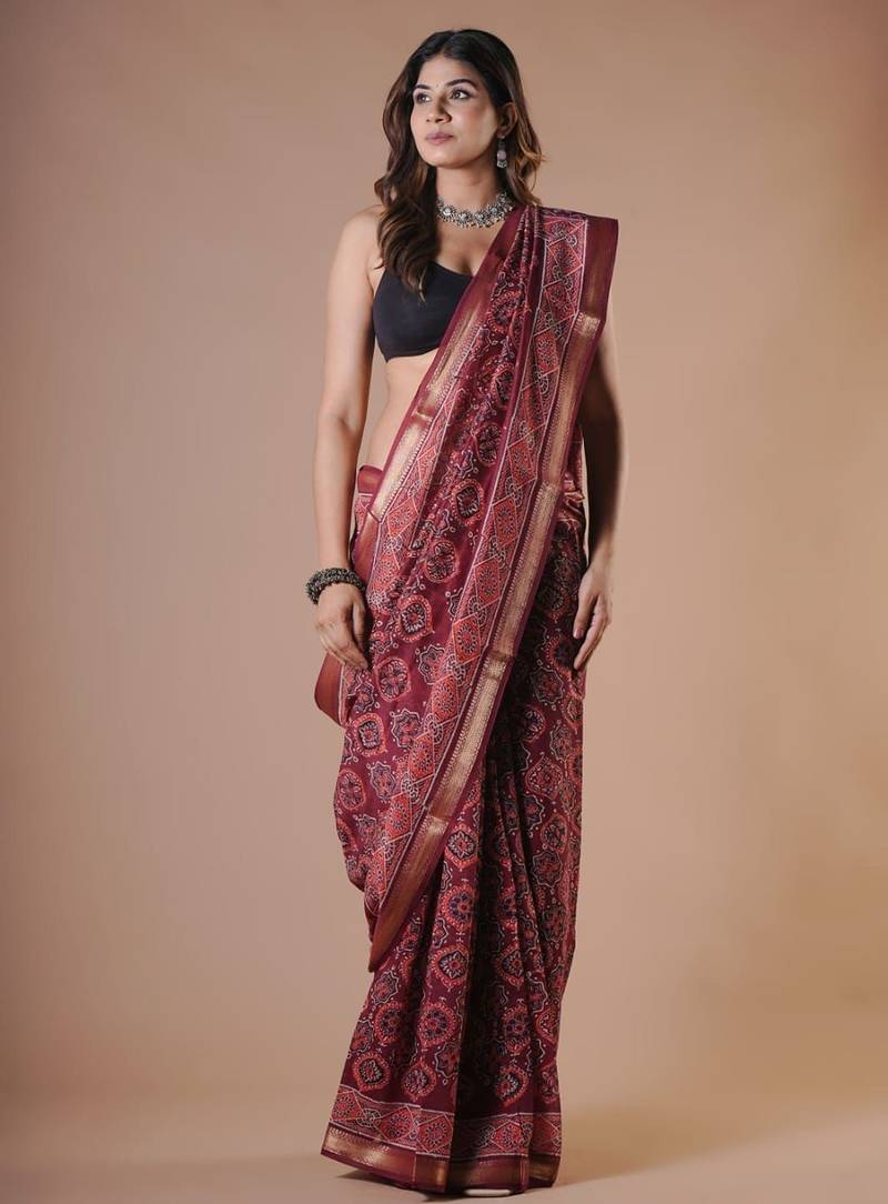 Maroon maheshwari silk saree with woven borders and beautiful hand block print