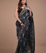 Dark grey maheshwari silk saree with woven borders and beautiful hand block print
