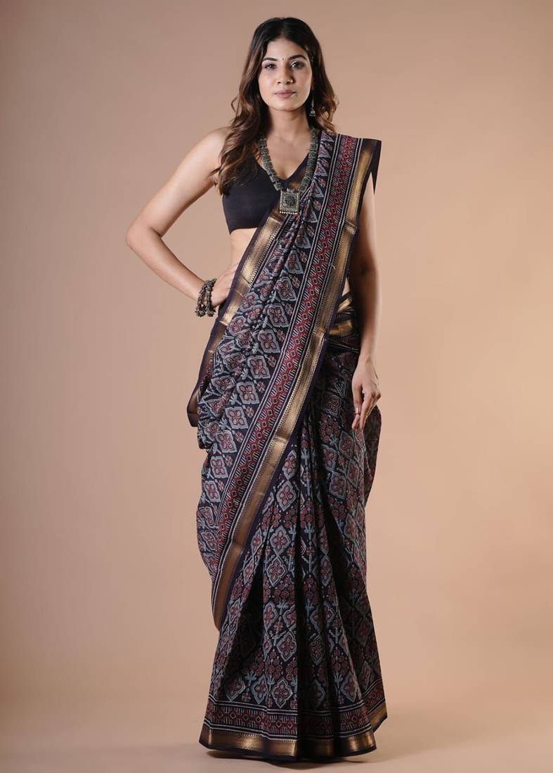 Black maheshwari silk saree with woven borders and beautiful hand block print