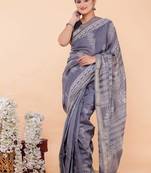 Grey maheshwari silk saree with woven borders and beautiful hand block print