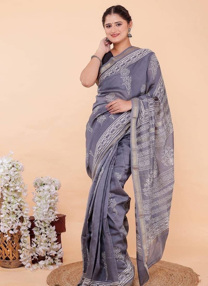 Grey maheshwari silk saree with woven borders and beautiful hand block print