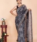Grey maheshwari silk saree with woven borders and beautiful hand block print