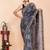 Grey maheshwari silk saree with woven borders and beautiful hand block print