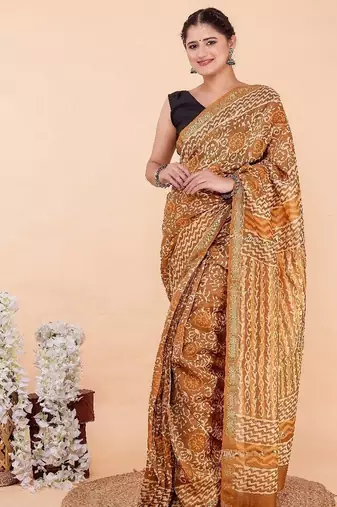 Orange maheshwari silk saree with woven borders and beautiful hand block print