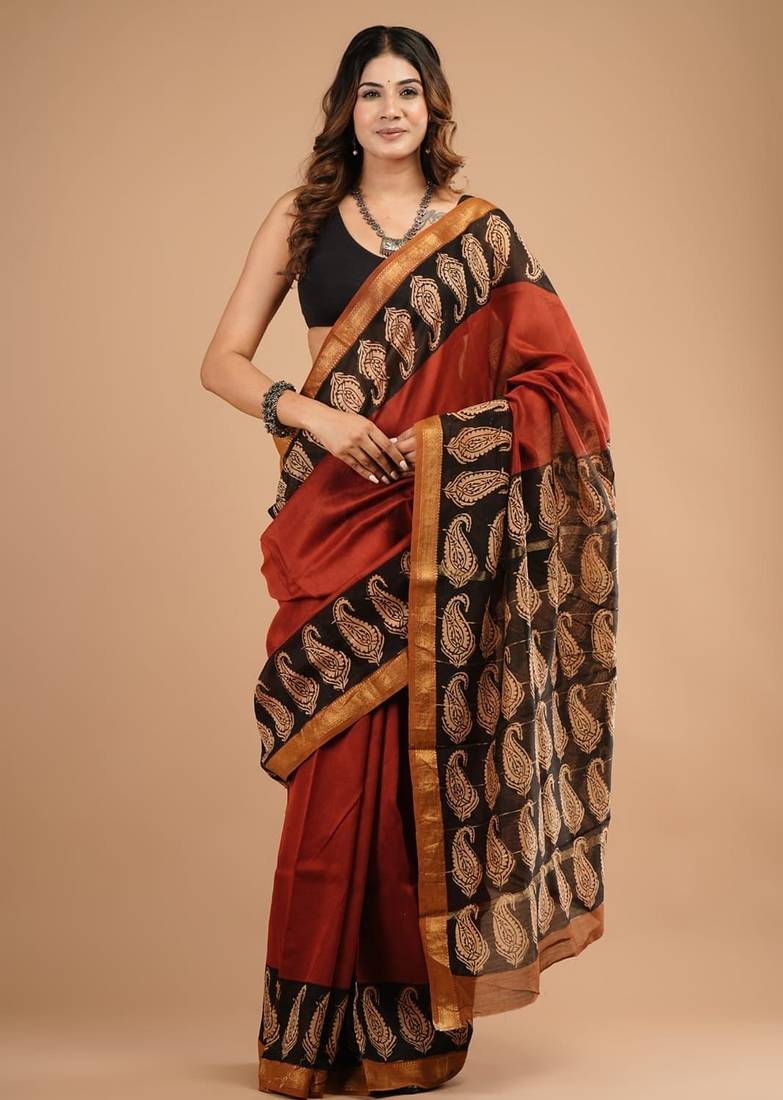 Red maheshwari silk saree with woven borders and beautiful hand block print