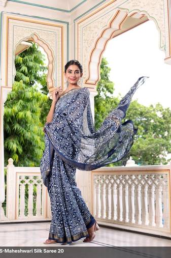 Blue maheshwari silk saree with woven borders and beautiful hand block print