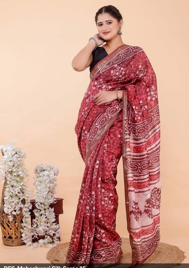 Magenta maheshwari silk saree with woven borders and beautiful hand block print