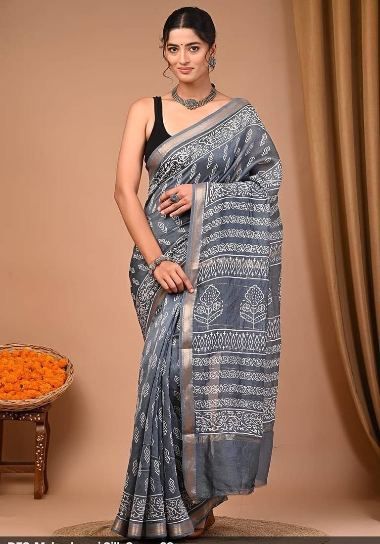Grey maheshwari silk saree with woven borders and beautiful hand block print