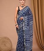 Blue maheshwari silk saree with woven borders and beautiful hand block print