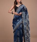Blue maheshwari silk saree with woven borders and beautiful hand block print