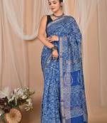 Blue maheshwari silk saree with woven borders and beautiful hand block print