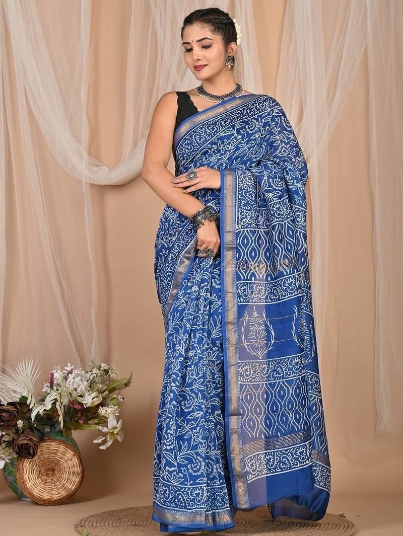 Blue maheshwari silk saree with woven borders and beautiful hand block print