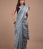 Sky blue maheshwari silk saree with woven borders and beautiful hand block print