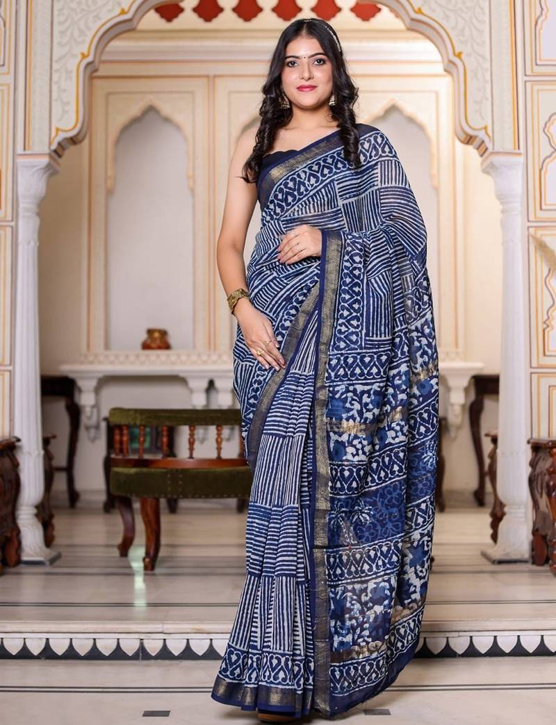 Blue maheshwari silk saree with woven borders and beautiful hand block print
