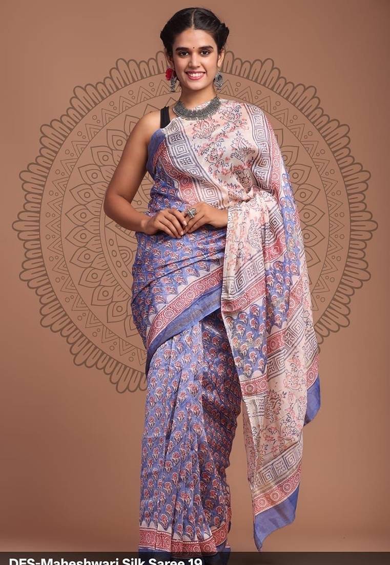 Purple maheshwari silk saree with woven borders and beautiful hand block print