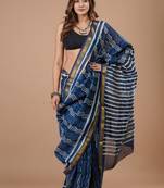 Blue maheshwari silk saree with woven borders and beautiful hand block print