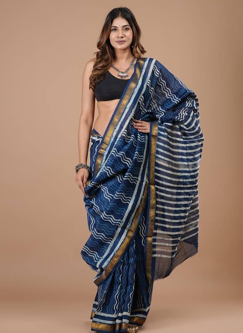 Blue maheshwari silk saree with woven borders and beautiful hand block print
