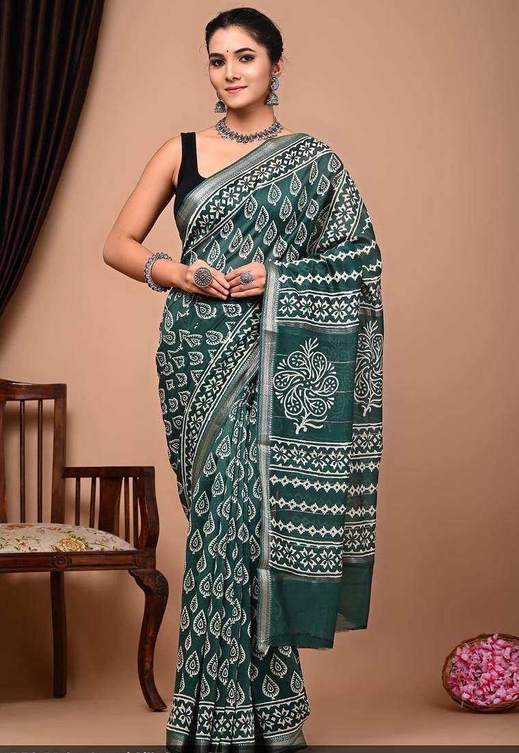 Green maheshwari silk saree with woven borders and beautiful hand block print