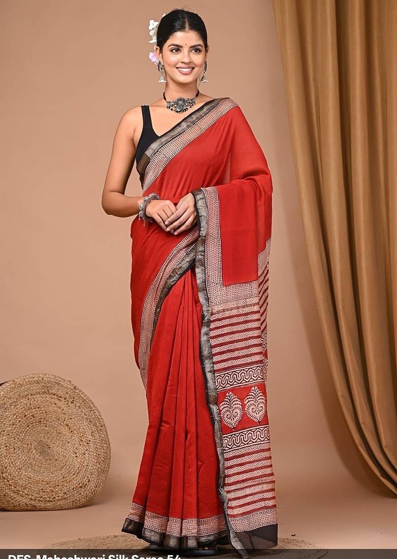 Red maheshwari silk saree with woven borders and beautiful hand block print