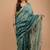 Green maheshwari silk saree with woven borders and beautiful hand block print