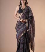 Black maheshwari silk saree with woven borders and beautiful hand block print