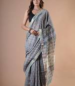 Grey maheshwari silk saree with woven borders and beautiful hand block print