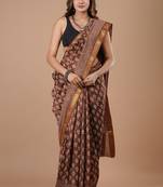 Brown maheshwari silk saree with woven borders and beautiful hand block print