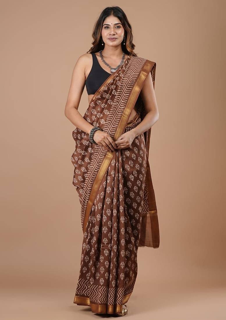 Brown maheshwari silk saree with woven borders and beautiful hand block print
