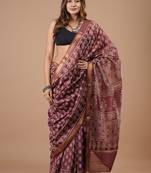 Purple maheshwari silk saree with woven borders and beautiful hand block print