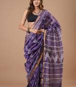 Blue maheshwari silk saree with woven borders and beautiful hand block print