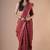 Maroon maheshwari silk saree with woven borders and beautiful hand block print