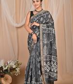 Grey maheshwari silk saree with woven borders and beautiful hand block print