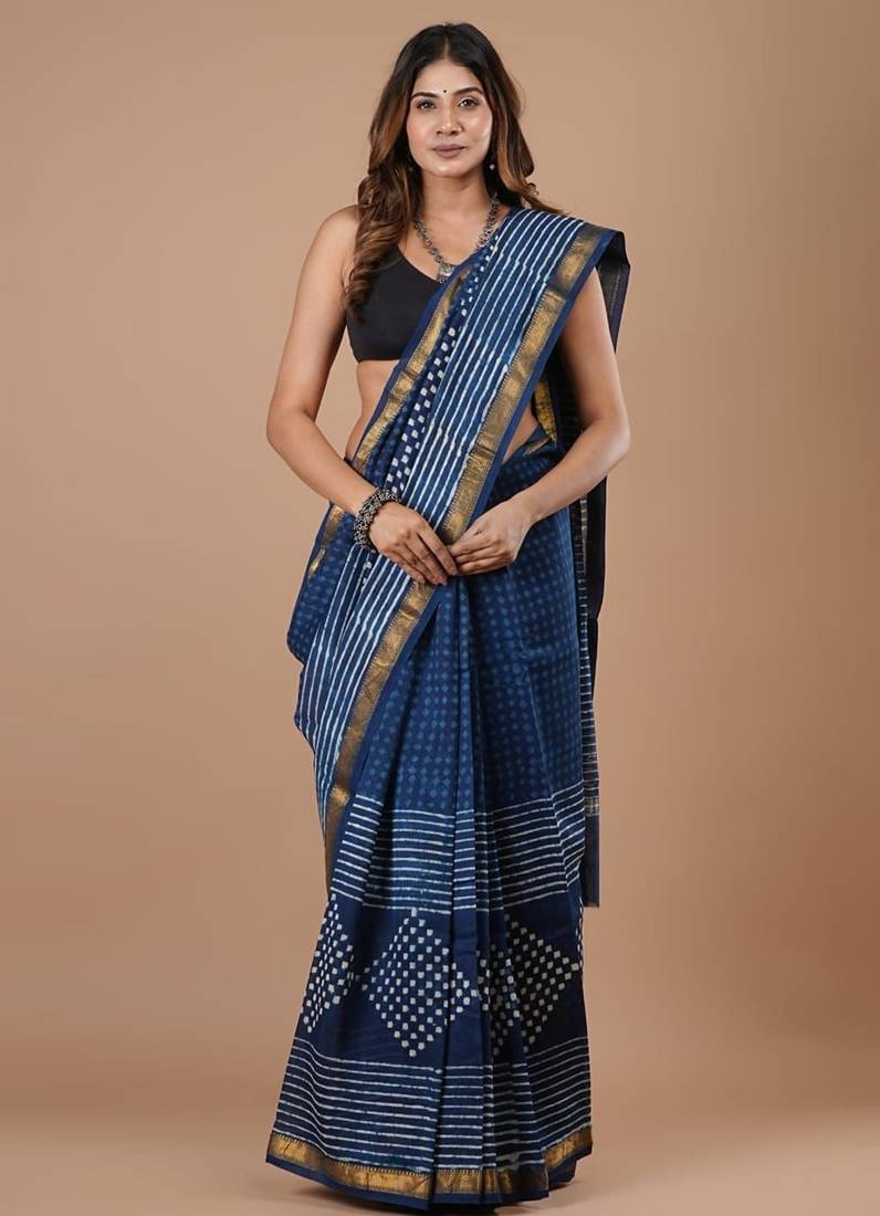 Blue maheshwari silk saree with woven borders and beautiful hand block print