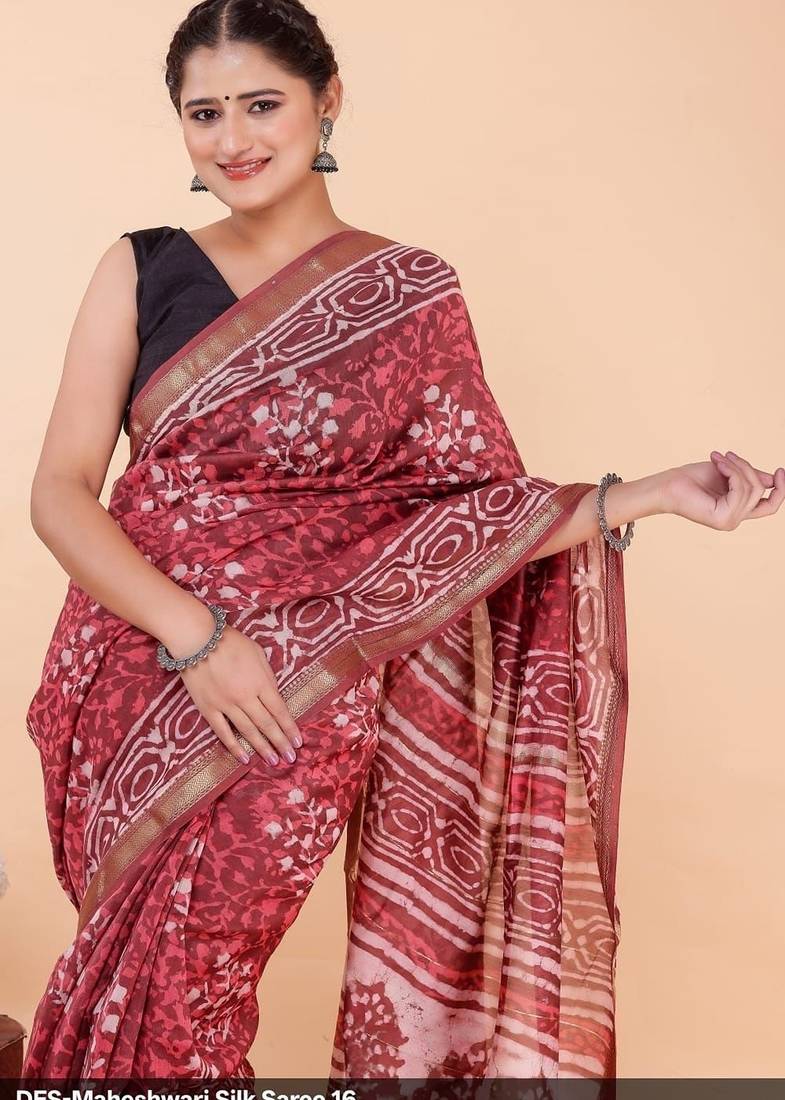 Red maheshwari silk saree with woven borders and beautiful hand block print