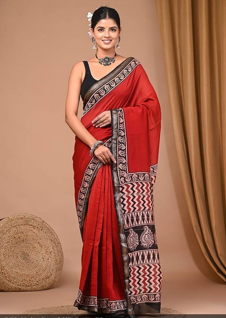 Red maheshwari silk saree with woven borders and beautiful hand block print
